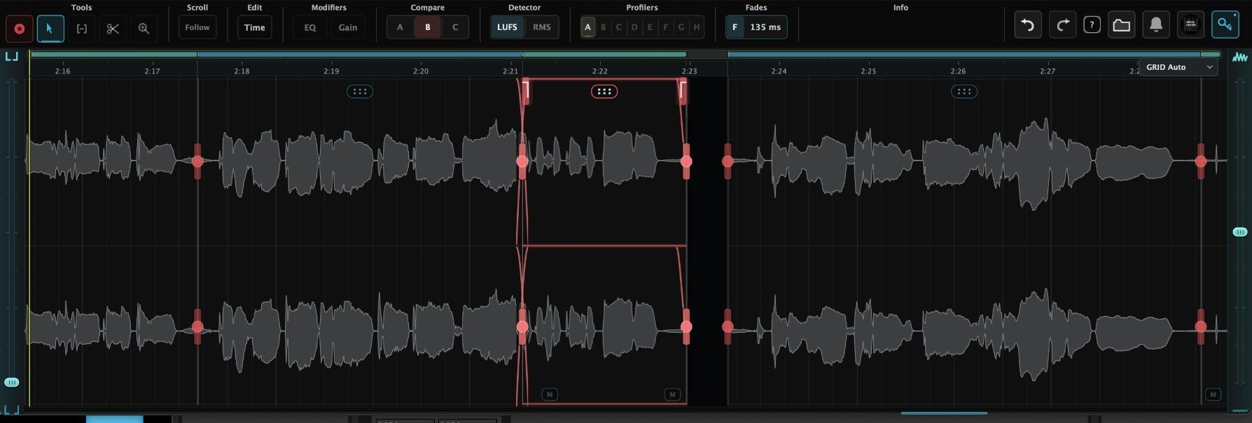Time mode: red boundary handles along the waveform, one segment selected and moved leaving a gap, fade ramps at its edges and mute badges at its lower corners